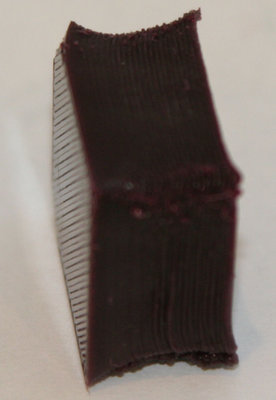 Shows concave sides, bad edges, bad top corners, tilted bottom corners