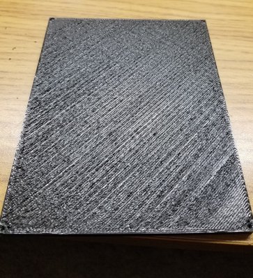 This is the lid after 3 layers atop 20 fast honeycomb infill