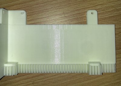 Layer between tabs and wall